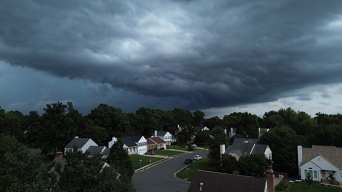 Dramatic storm shelf cloud rolling over a Northern Virginia neighborhood